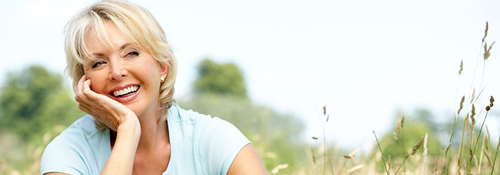 Chiropractic Mt Pleasant SC Middle Age Woman In Meadow Chiropractic Mt Pleasant SC Middle Age Woman In Meadow